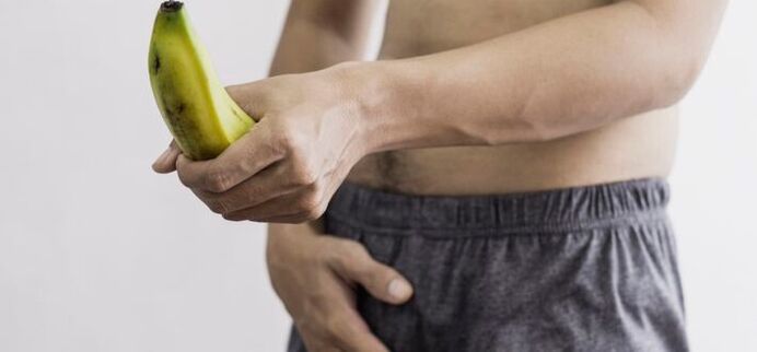 männlech Penisgréisst mat enger Bananen als Beispill